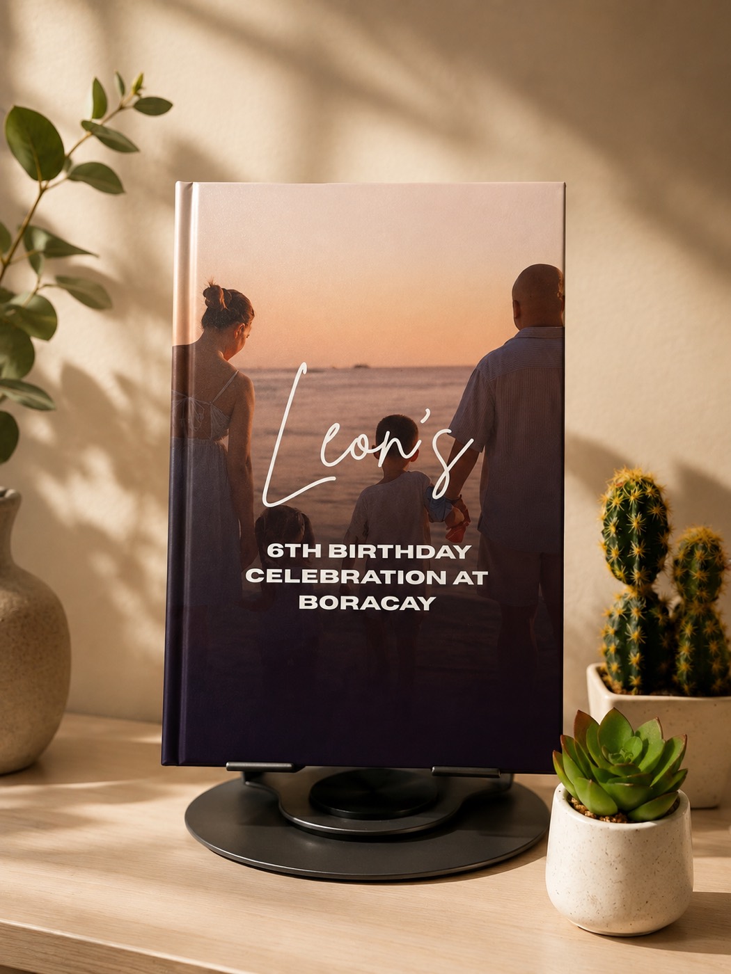 Photobook cover for Leon's 6th Birthday Celebration at Boracay with a sunset family photo